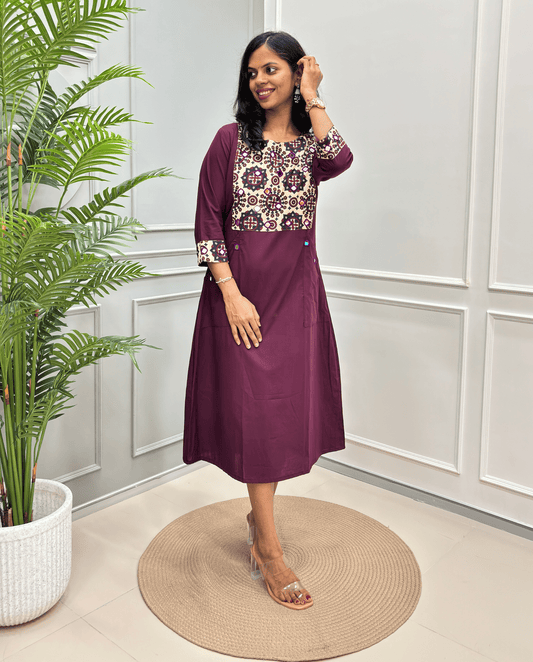 Women's  Purple A-line Cotton Long Kurti with mirror embroidered yoke along with traditional Ajrakh print on front and sleeves