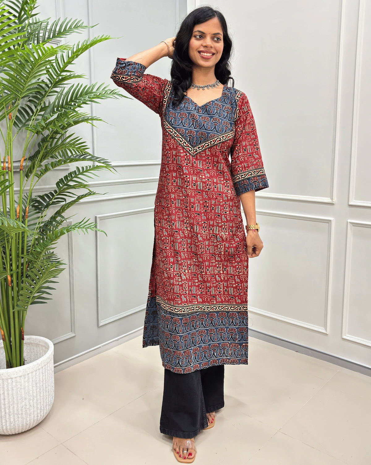 Red women's Hand-block Ajrakh Pure Cotton Long-kurti featured witn geometric print and blue & red ajrakh print on front and sleeves. 