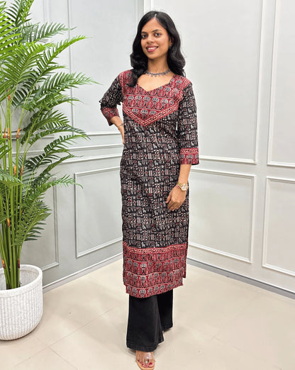 Black women's Hand-block Ajrakh Pure Cotton Long-kurti featured witn geometric print and grey & red ajrakh print on front and sleeves. 