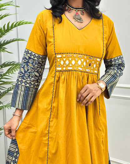 Close-up of Handblock cotton long kurti with intricate blue & beige ajrakh patterned sleeves cuffs & a mirror work embroidery.