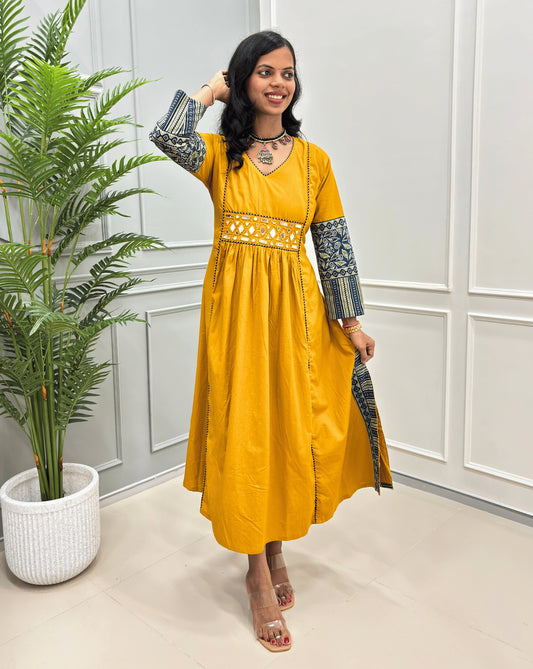 Women's Mustard Yellow Cotton long kurti with Ajrakh print Sleeves, Mirror work on waist look a like wearing Belt, a Handcrafted ethnic wear by Rajwadse.