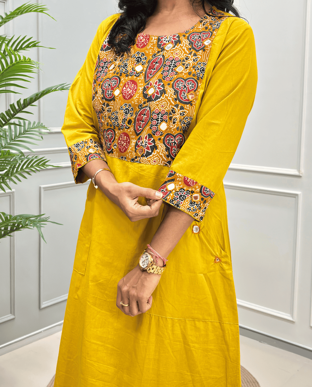 Women's Mustard yellow One-peice with a heavily Mirror embroidered multicolor yoke and matching embroidered cuffs, along with pockets
