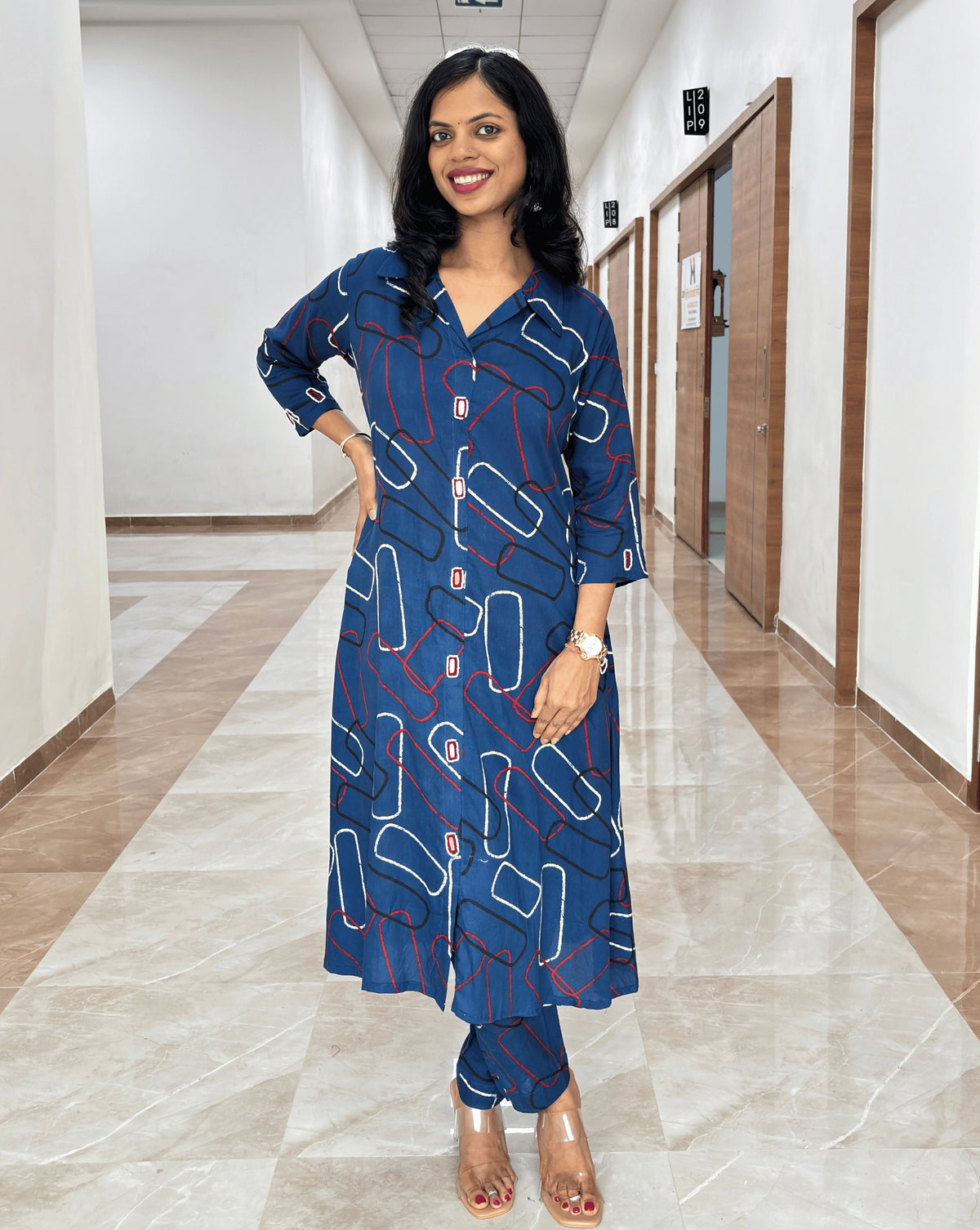  women's premium Blue Coord-set for women featuring Geometric Abstract print in white & Red over a blue base with comfortable pants 
